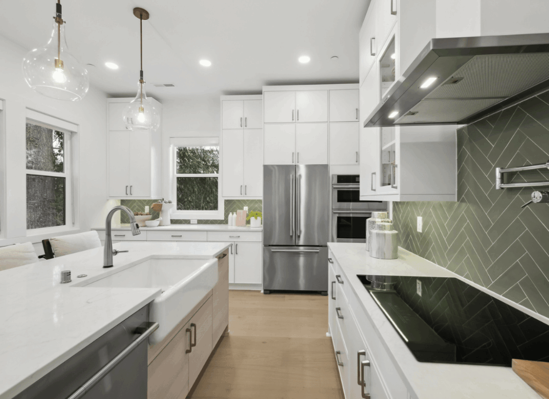 Arborstone interior kitchen featuring induction stove and spacious floor plan